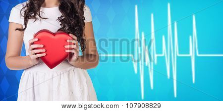 Woman present heartbox beside pulse line