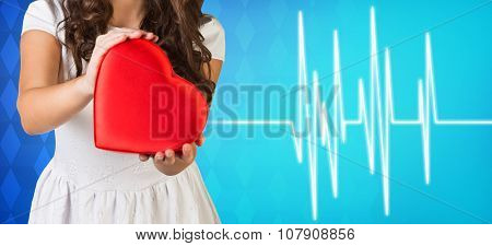 Woman present heartbox beside pulse line