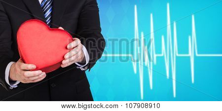 Man present heartbox beside pulse line