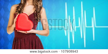 Woman present heartbox beside pulse line