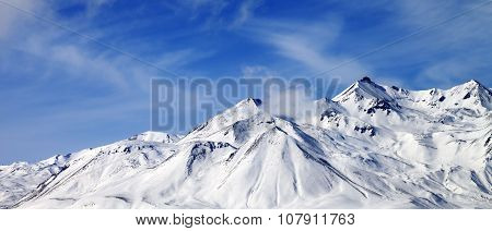 Panoramic View Of Winter Snowy Mountains At Windy Day