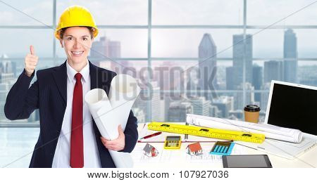 Woman architect in amodern office. Construction and renovation concept.