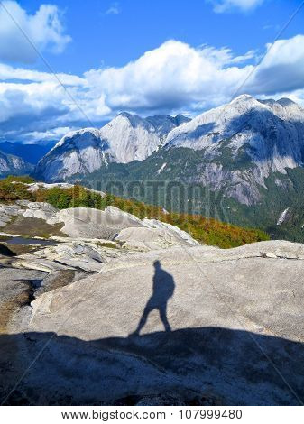 Solo Wandering Silhouette in Mountains