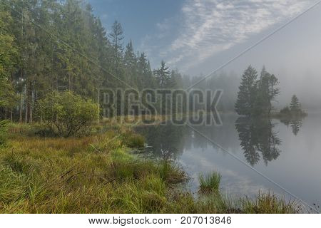 Morning fog near Bahnak ponds in autumn Kladska village