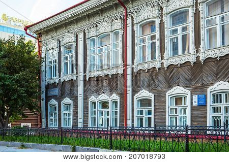 Novosibirsk Siberia Russia - 17 September 2017: apartment house burghers M.N. Pyatkova a monument of wooden architecture (built in early 1905) Communist street 23