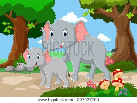 Cute mother and baby elephant with a background of a beautiful garden