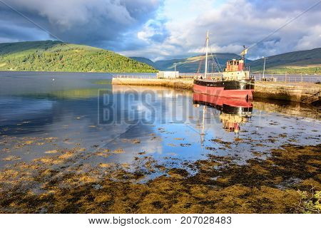 Sunset And Boat On Loch Fyfe At Inveraray, Scotland