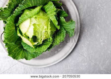 Fresh Green Cabbage In Metal Plate On Grey Background. Top View. Copy Space.