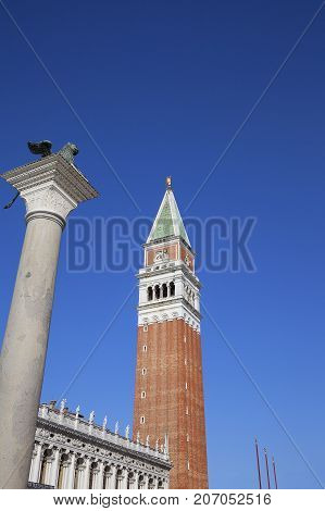 Piazza San Marco with St Mark's Campanile and Column of San Marco Venice Italy. St. Mark's Square is the most visited tourist destination in Venice