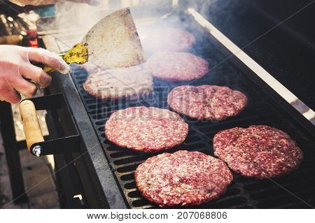 Frozen Burger In The Cook Hand Ready For Preparing