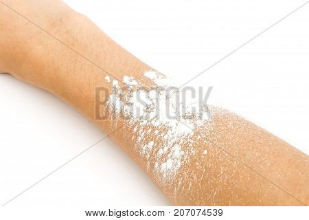 talcum powder in hand isolated on white background