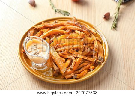 Sweet potato fries on table