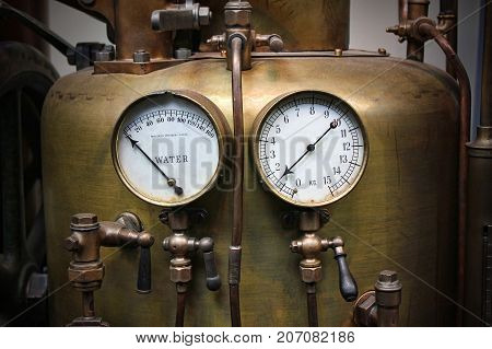 Old vintage copper high pressure balloon with 2 air gage manometer.