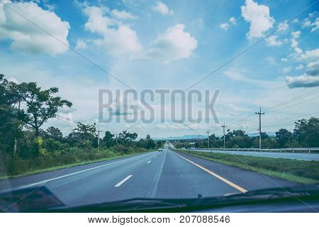 Landscape road paved road Rural Roadside View Mountain View. Road transport road. Car running on the street