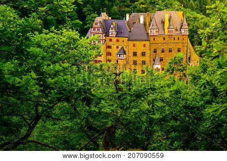 Eltz Castle in Rhineland-Palatinate, Germany. Beautiful landscape with medieval architecture.
