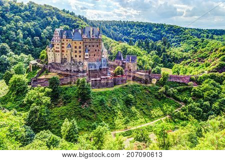 Eltz Castle in Rhineland-Palatinate, Germany. Beautiful landscape with medieval architecture.