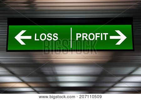 Financial concept. Loss and Profit Arrows sign indicated stock market activity.
