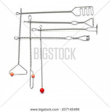 Set of instruments for speech therapist on white background