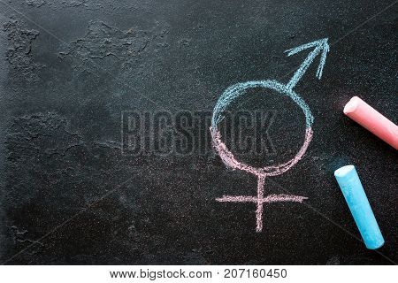 Symbol Of A Transgender Drawn Chalk On A Black Background With Space For Text