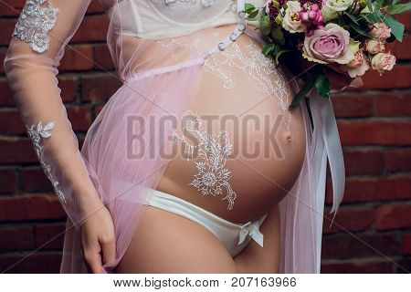 young pregnant women girl in lingerie pretty