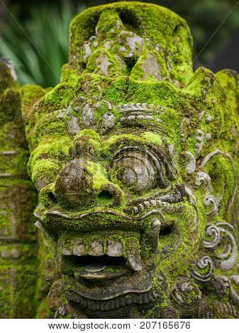 Rakasa Balinese Stone Sculpture Covered With Moss.