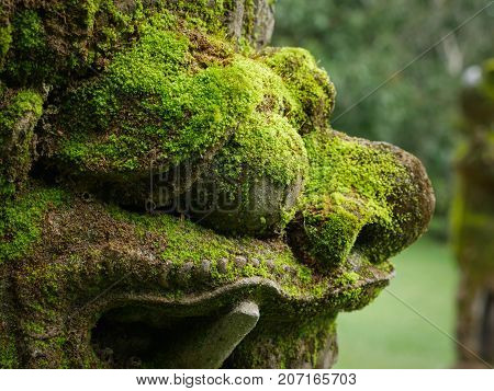 Rakasa Balinese Stone Sculpture Covered With Moss.