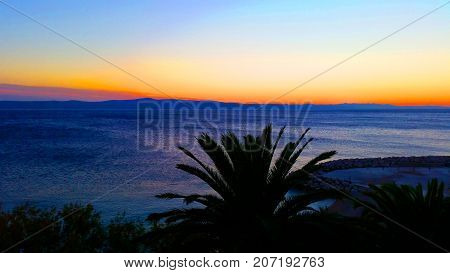 Autumn sunset over the Adriatic Sea in Podgora, Croatia