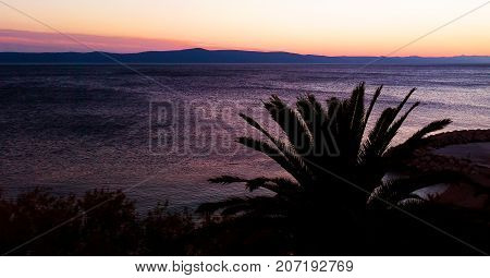 Autumn sunset over the Adriatic Sea in Podgora, Croatia