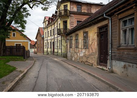 Narrow street with old buildings in Cesis town, Latvia