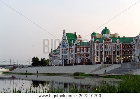 Yoshkar-Ola, Russia - August 30, 2017 Photo of the view on the embankment of Amsterdam in Yoshkar-Ola and the building in the European style