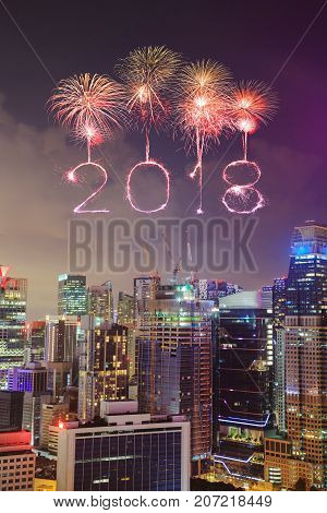 2018 Happy New Year Firework Sparkle With Cityscape Of Singapore City At Night