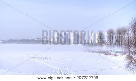 Minsk. Winter. Winter fog over the river Svislach