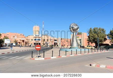 View Of The City. Monument Near Building Of Municipality In Ouarzazate