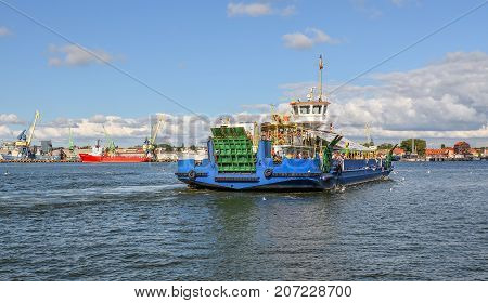 Klaipeda, Lithuania - August 22, 2017: Big passenger barge and view on Klaipeda port and  Curonian Lagoon. View from The Curonian Spit, Klaipeda Lithuania