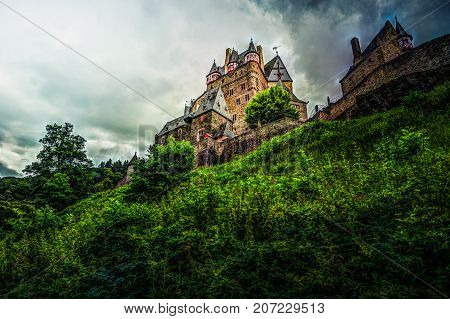 Eltz Castle in Rhineland-Palatinate, Germany. Beautiful landscape with medieval architecture.