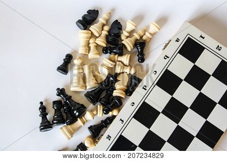 Chess Board and pieces on the table