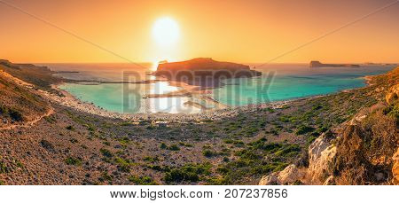 Amazing view of Balos Lagoon with magical turquoise waters, lagoons, tropical beaches of pure white sand and Gramvousa island on Crete, Greece