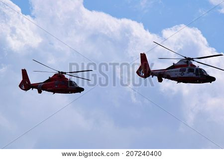 October 3, 2017 in Los Angeles, CA:  Pair of Coast Guard Helicopters conducting a search and recue mission for injured hikers in Griffith Park taken in the skies above Los Angeles, CA and are often the first responders for stranded and injured people
