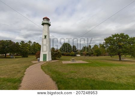 Michigan Bizarre Roadside Attractions. The Clare lighthouse is landlocked and over 50 miles from the nearest Great Lakes Coast. The lighthouse is located at the Michigan Welcome Center in Clare.
