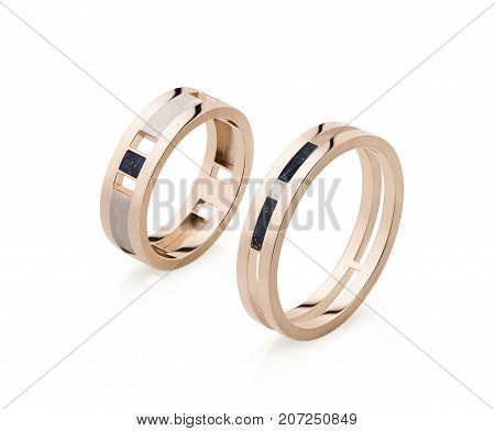 Two Gold Rings On White Background
