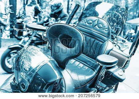 Detail of the leather luxury motorbike seat. Front view. Blue colored.