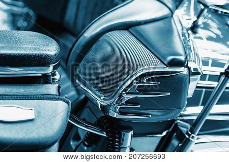 Detail of luxury motorbike speaker. Blue colored.