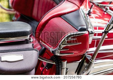Detail of red luxury motorbike speaker. Front view