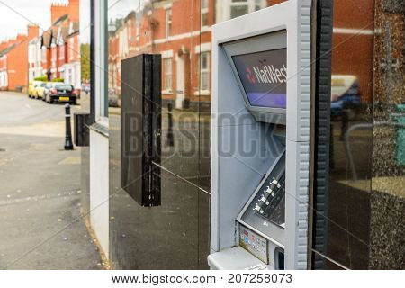 Northampton Uk October 3, 2017: Natwest Bank Atm Closed Down With Wooden Board Northampton