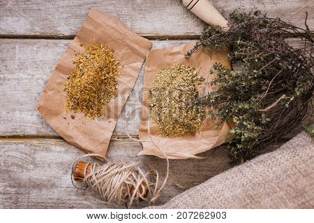 Quackery top view. Medical herbal tea infusions. Alternative medicine, homemade health herb ingredients concept