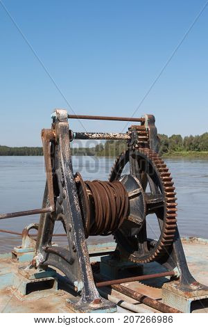 Fluvial Port: Rusted and Old Manual Naval Winch
