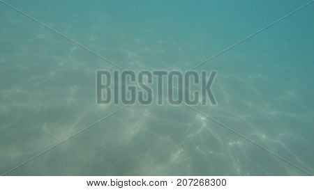 Magnificent sea bed, of turquoise blue one transparent.