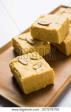 Stock photo of Soan Papdi or Soan roll or Patisa or patisha, popular sweet from India. selective focus