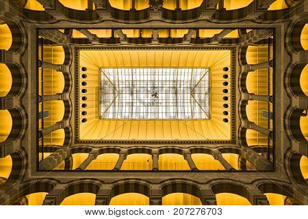 AMSTERDAM NETHERLANDS - JUNE 21 2016: Detail picture of the Magna Plaza's interior atrium. Amsterdam Netherlands.