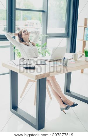 Relaxed Successful Assistant Is Resting At Her Work Spot And Dreams Of Holiday Which Is Coming, In F